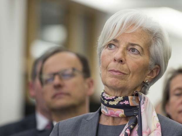 The world outlook is clouded by "weak growth, no new jobs, no high inflation, still high debt - all those things that should be low and that are high," IMF Managing Director Christine Lagarde said in an interview in Frankfurt on Tuesday.