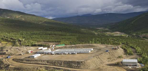  Aerial view of the Victoria Gold Eagle Gold Project. The 4.8 m oz Resource is located under the switchback road markings on the hillside, and the valley still show the historic placer mine workings. 