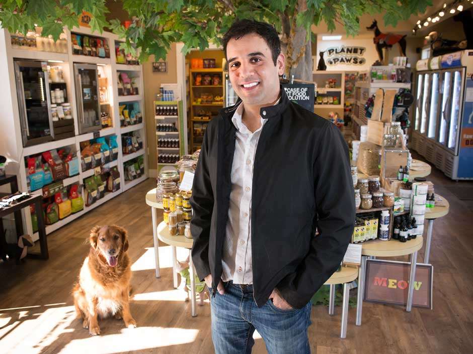 Rodney Habib, owner of Planet Paws Pet Essentials in his Dartmouth shop with his dog Reggie, a 7 year old Red Golden Retreiver. 