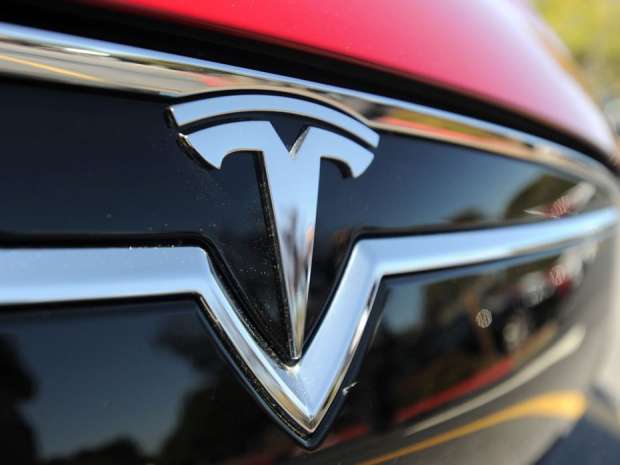 Analysts are upgrading their ratings on Tesla Motors Inc.'s stock based on a recent tour of the electric car company's giant factory in Freemont, Calif.