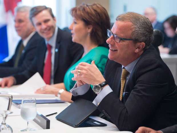 Premiers, left to right, Quebec's Philippe Couillard, New Brunswick's Brian Gallant, British Columbia's Christy Clark and Saskatchewan's Brad Wall at the Council of the Federation in Vancouver. 