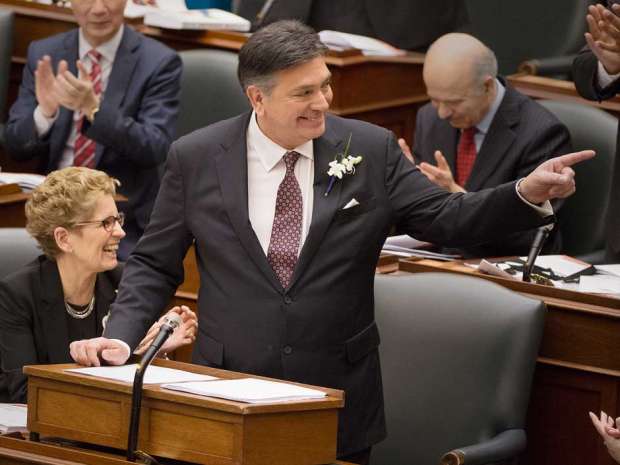 Ontario Premier and Liberal Party Leader Kathleen Wynne (LEFT) and Minister of Finance Charles Sousa (RIGHT) released the budget at the Ontario Legislature in Toronto.