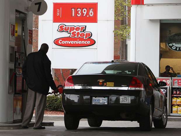 A customer fuels up at a Petro-Canada station