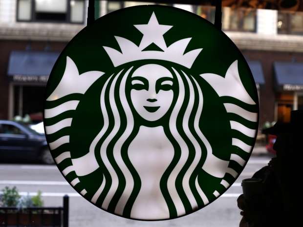 Under Starbucks' current rewards program, customers earn redeemable points for every purchase. The new program will award points for every dollar spent.