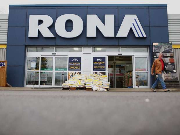 A customer exits a Rona Inc. store in Toronto.