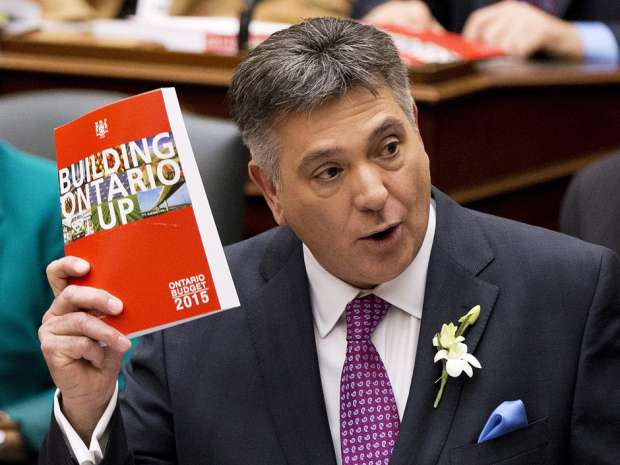 Ontario finance minister Charles Sousa delivers the tabling of the budget at Queen's Park in Toronto on Thursday, April 23, 2015. Standard & Poor's release says, "Ontario is an underperformer on its budgetary performance and debt burden versus domestic and international peers."