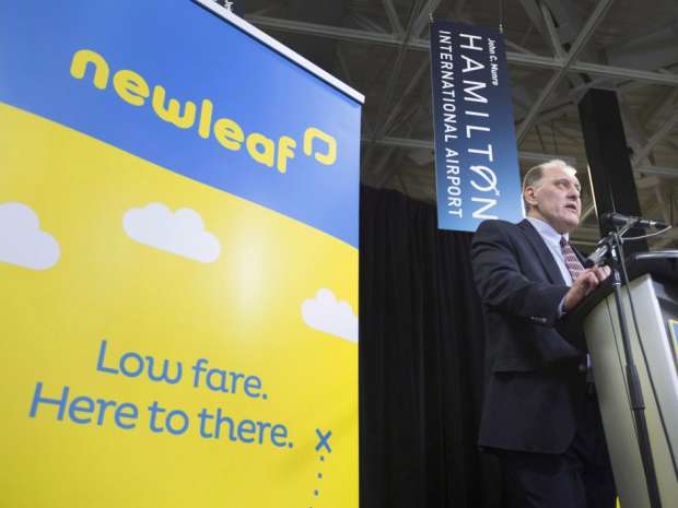 Dean Dacko, Chief Commercial Officer of NewLeaf Travel speaks at a press conference in the arrivals area of the John C. Munro Hamilton International Airport, on Jan. 6, 2016. 